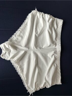SHEIN Cream Lace-Trim Mid-Rise Booty Shorts